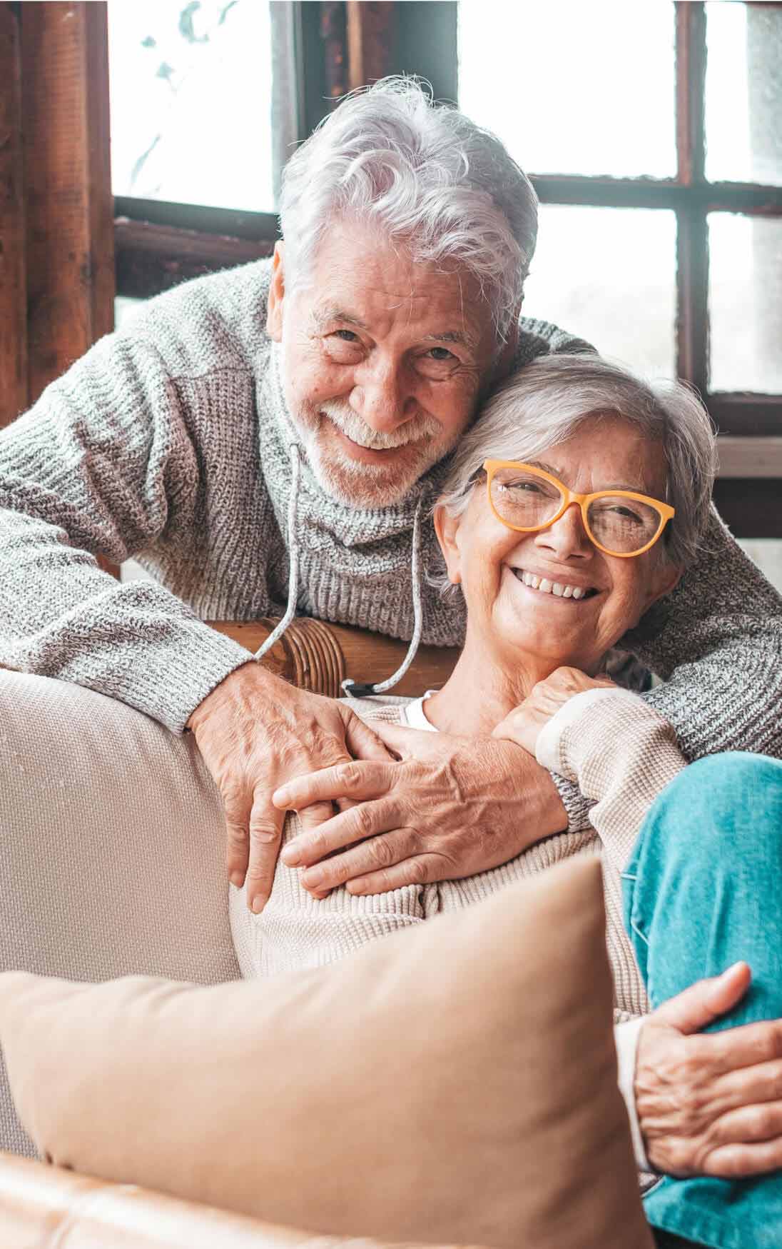 Happy senior couple smiling