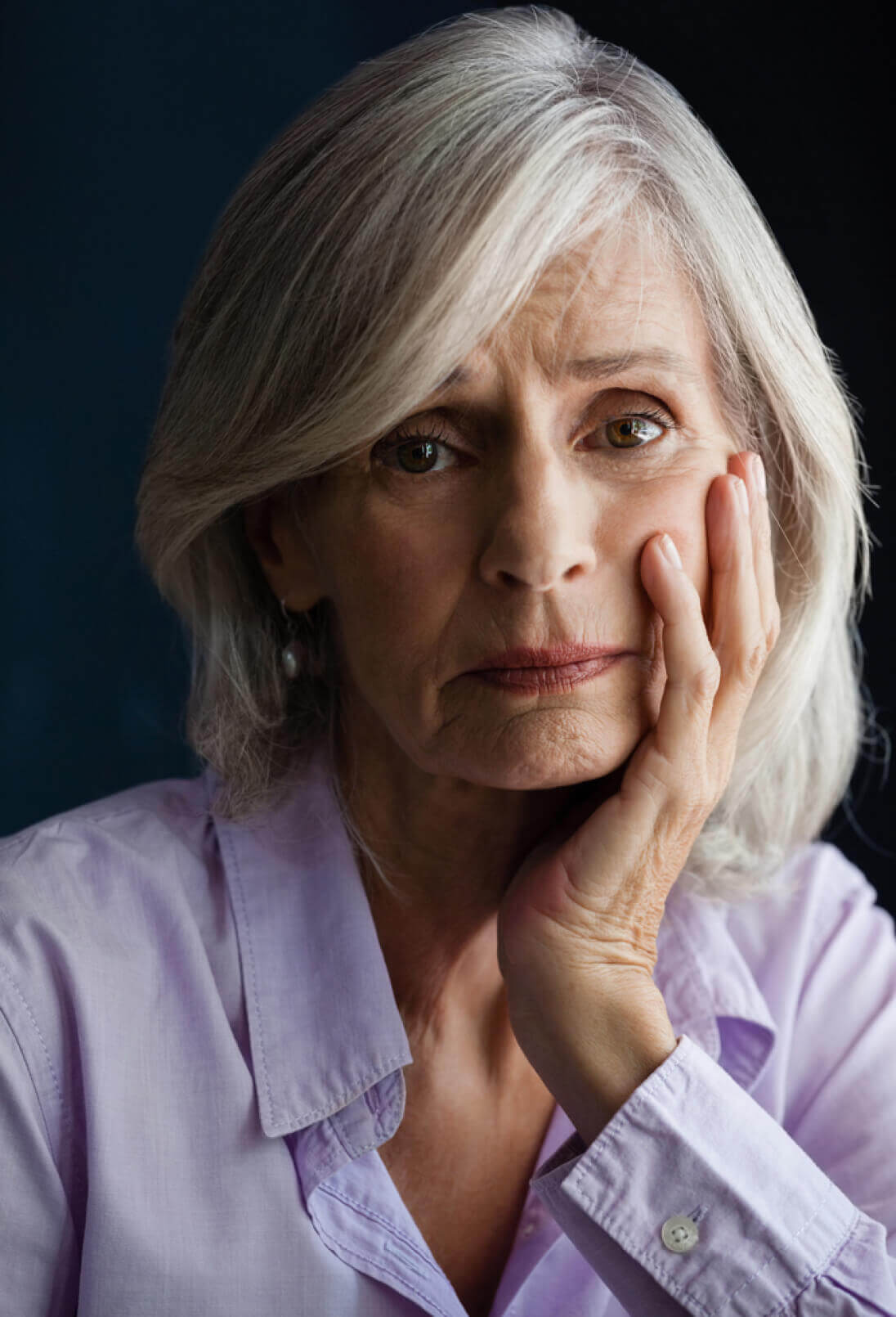 Sad senior woman