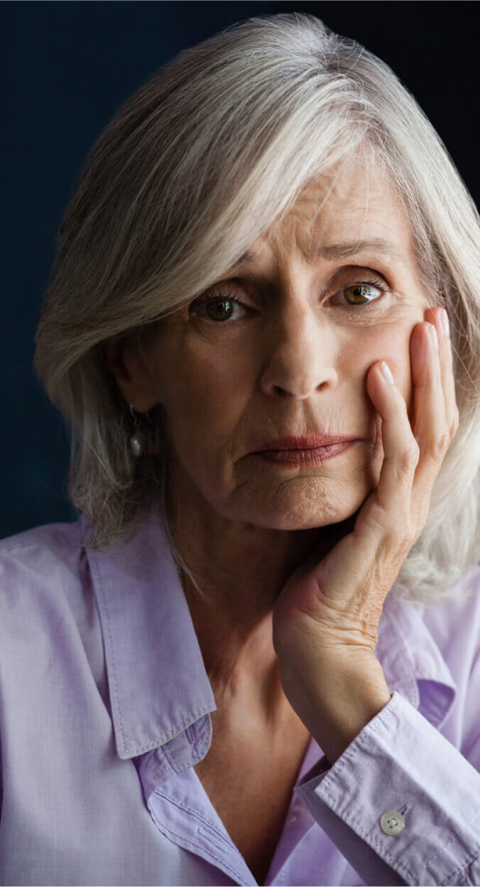 Sad senior woman