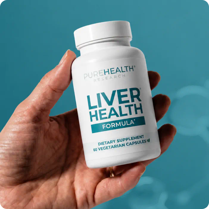 Hand holding Liver Health Formula bottle