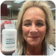 Customer photo holding product bottle